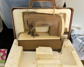 miniature singer sewing machine in travel case