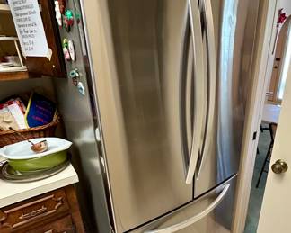LG stainless refrigerator ( YOU must bring tools to remove the doors and be prepared to move it. We do NOT move furniture or appliances)