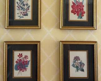 Four framed floral prints