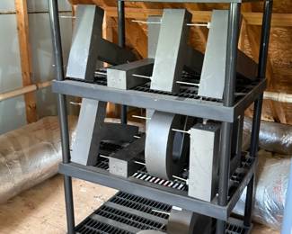 Plastic shelving holding building signage letters