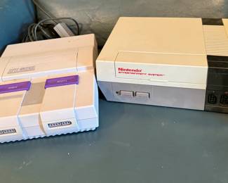 Ninetendo Super NES Control Deck (Model SNS-001) and Ninetendo Entertainment System (Model NES-001)
