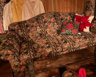 Christmas pillows and soda and love seat