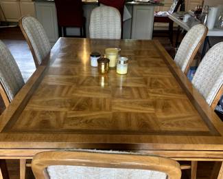 Dining table with 3 leaves and 8 chairs