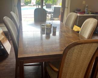 Dining table with 3 leaves and 8 chairs