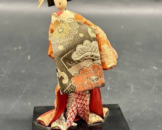 Japanese Geisha Doll on Wooden Stand