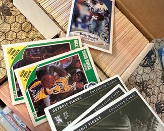 Baseball, football and basketball tarding cards