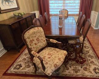 Dining Room Table 
70" long x 42" wide (without leaves)
comes with 2 - 20" leaves and pads