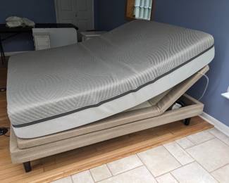 Adjustable queen size bed. Comes with a massage option built into the mattress. 