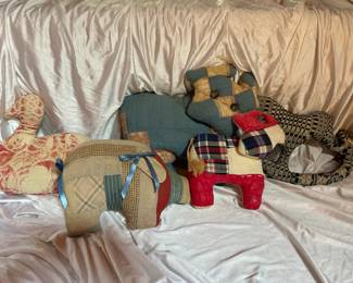 Animal pillows made from Vintage Quilts