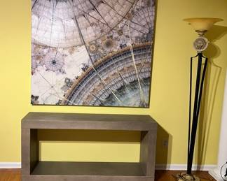 Large geometric print and contemporary gray side table