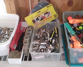 Lots of wrenches screwdrivers Hammers and more