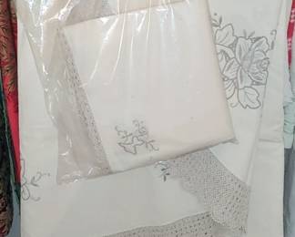 Gorgeous and forgeryed tablecloth with lace trim all linen fresh and crispy from the cleaners