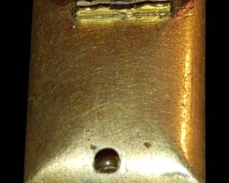 The latch on the back is broken off- it's worth mentioning that the hair watch fob matches the color of the hair and the miniature portrait. These are family heirloom items all from the same estate