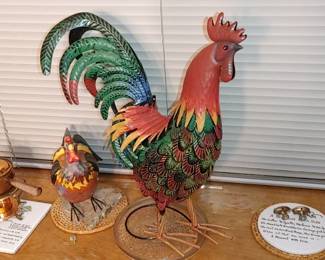 Beautiful roosters hanging around in the bay window in the kitchen!