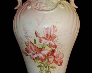Stunning  Robert Hanke Porcelain Factory, originally located in Ladowitz, Austria (now Ledvice, Czech Republic). This particular Vice is 12 in tall and features snails for as handles.
This ewer-shaped vase features hand-painted floral motifs, often with gold gilt accents, characteristic of the Art Nouveau or Secessionist style prevalent during that period. 