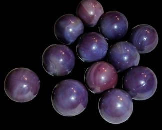 Beautiful antique purple swirl marbles