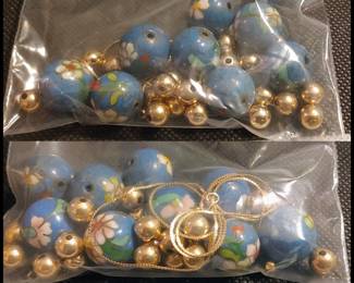 Beautiful cloisonne beads and gold beads with 14 karat gold necklace needs to be restrung