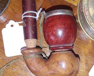 Bruyere tobacco pipe with a distinct, long stem and a separate, lidded containe