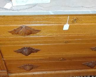 Gorgeous Eastlake chest with marble top and fruitwood pulls