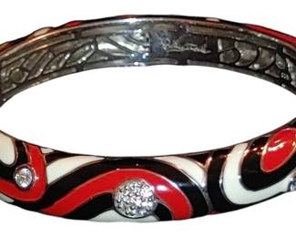 Belle Étoile's Vortice Collection features swirls of hand-painted Italian enamels with gorgeous white stones set into rhodium-plated, nickel allergy-free, 925 sterling silver.