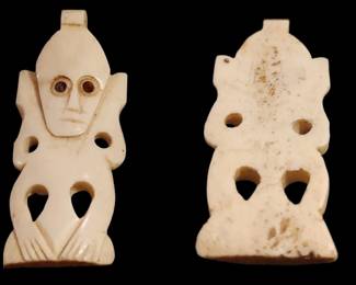 Ancient hand carved bone pendant of a winged creature