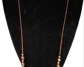 Stunning vintage 14 karat gold beaded necklace on 14 karat gold chain
Available at the sale