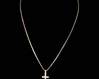 Dainty 14 karat gold chain and 14 karat gold cross necklace