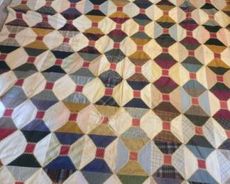 Vintage heirloom Quilt made with silk and other material connected with the Red Square