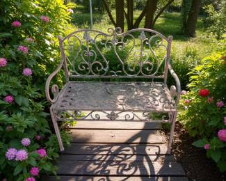 Wrought iron two seater garden bench