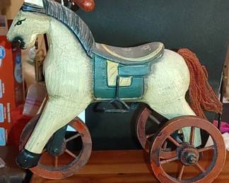 Small wooden horse for a doll