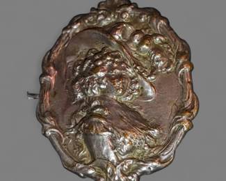 Art nouveau silver over copper Victorian brooch in reposé