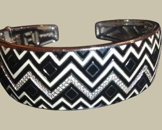 Italian Belle Etoilea Sterling Cuff Bracelet with black and white enamel Pave' CZ's
Belle Etoile carries the latest in European fashion. High quality craftsmanship.