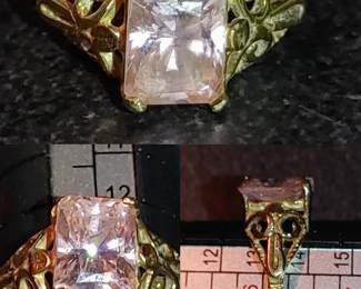 Vintage pink ice/pink Sapphire 10k gold emerald cut stone. Beautiful scrollwork
SIZE 6