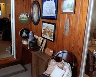 This house is full of small rooms nooks and crannies this room is off of the craft room & the main parlor it features old bottles portraits books and more