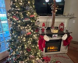 2 hobby lobby xmas trees and u guessed it
Red truck ornaments and metal tin country ornaments