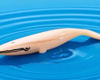 Clyde Piscoxa Signed Carved Whale Figurine