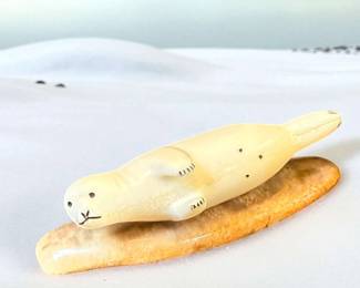 Inuit Carved Seal Figure With Scrimshaw