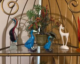 Figurines and faux potted planter