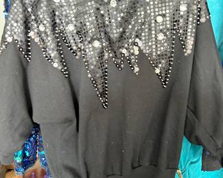 Black with various shiny sequence and wonderful decorations comes with those pads you know those 80s and 90s