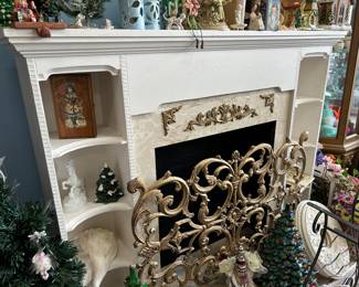 another fireplace masterpiece with a lovely gold solid metal fireplace screen assorted brick rack of the 60s and 70s kind in the background