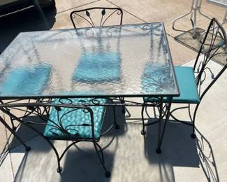 Gorgeous glass table with 4 chairs. Chairs were recently reupholstered. Asking $125.