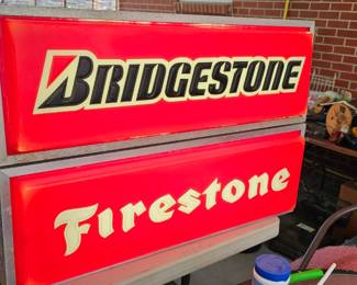 Firestone and Bridgestone shop signs in good working condition