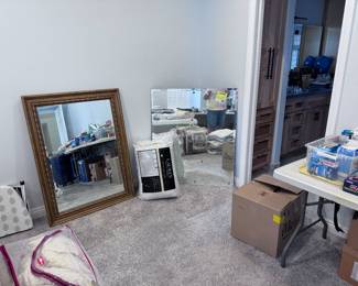 A few mirrors and folding ironing board
