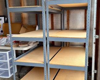 2 gray shelving units