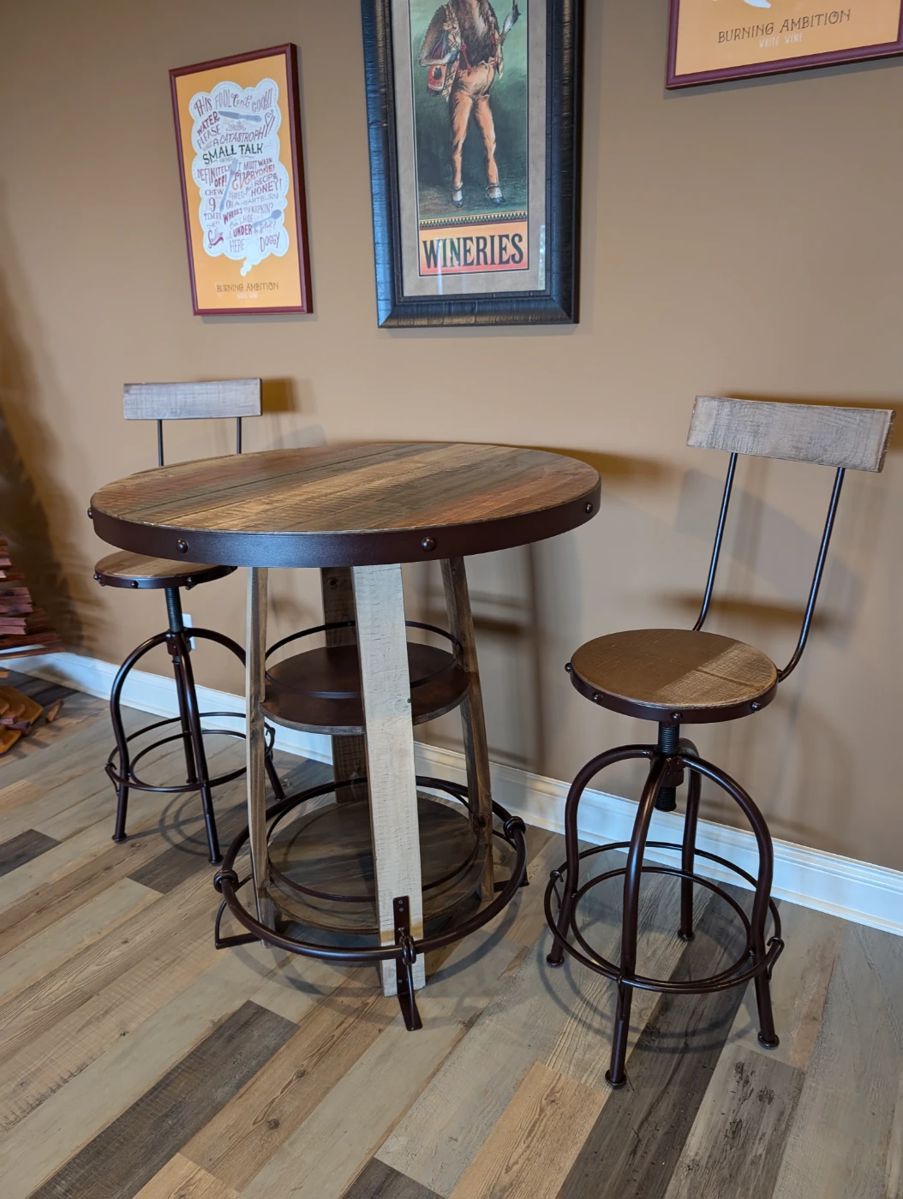 Barrel style pub table with two swivel barstools