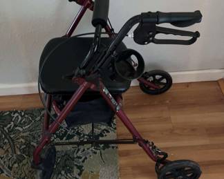 HKM030 - Red Walker with Wheels - Has a Seat w/Storage Too