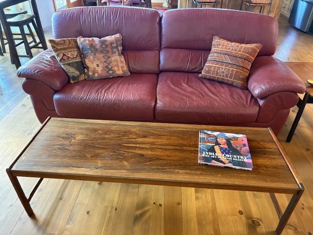 Dux Denmark MCM teak coffee table, 60" x 20"; Natuzzi 90" leather sofa