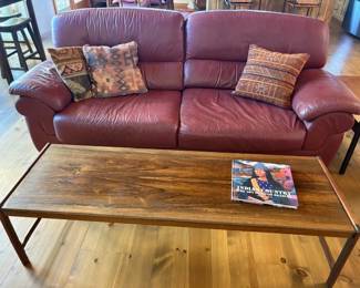 Dux Denmark MCM teak coffee table, 60" x 20"; Natuzzi 90" leather sofa