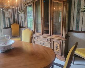 This mid century set has never had anything sitting on it without a place mats.