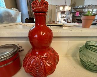 $32~RED DECORATIVE DECANTER